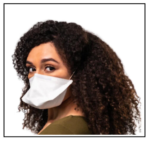 photo of a Black light skinned person wearing a white duckbill respirator with head straps tucked under their brown 3C curly hair